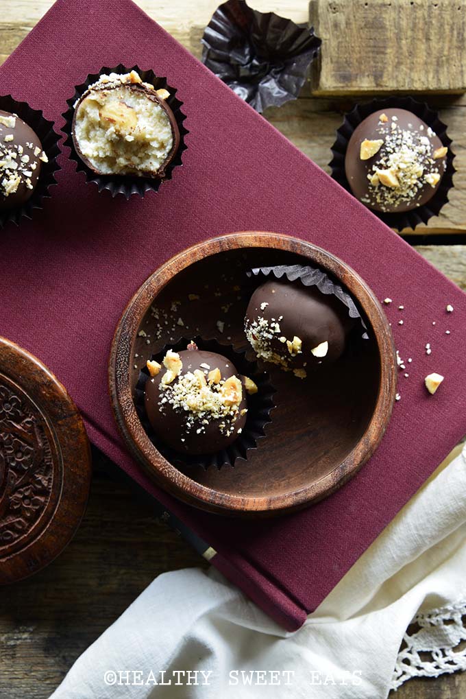 Low Carb Samoa Cookie Truffles in Wooden Dish on Red Book